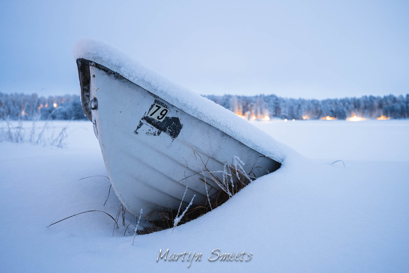 Rowing boat in the snow at Punkaharju, Finland